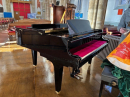The baby grand piano in position - 19 January 2024