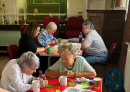 Next to them Margaret told Linda how to do Diamond Painting.